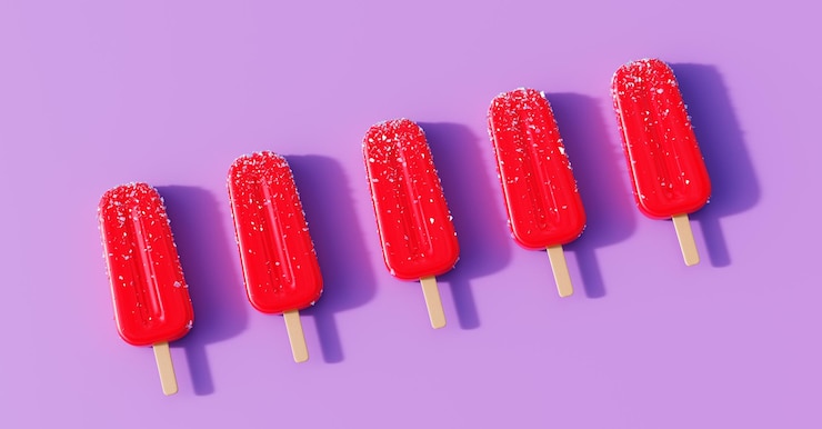 Zdjęcie tło malinowych popsicles owocowe lody popowe