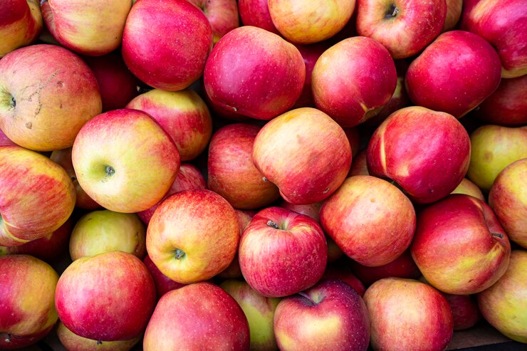 Zdjęcie tło naturalnych organicznych czerwonych jabłek zamknięty up