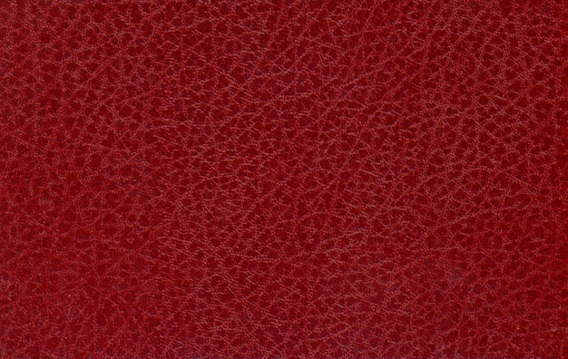 Tło o teksturze sztucznej skóry w kolorze maroon red leatherette