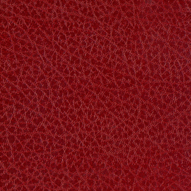 Tło o teksturze sztucznej skóry w kolorze maroon red leatherette