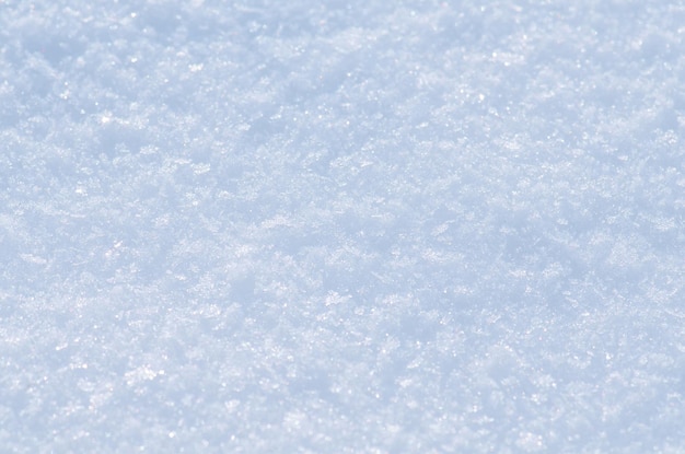 Tło świeżego śniegu Naturalne tło zimowe Tekstura śniegu w odcieniu niebieskim