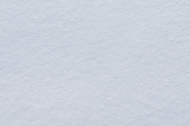 Tło świeżego śniegu Naturalne tło zimowe Tekstura śniegu w odcieniu niebieskim