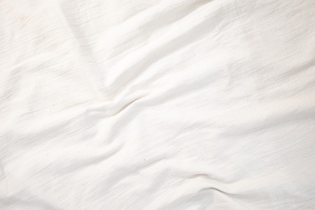 Tło tkaniny Białe płótno lniane pogniecione naturalne płótno bawełniane Naturalny ręcznie robiony lniany widok z góry