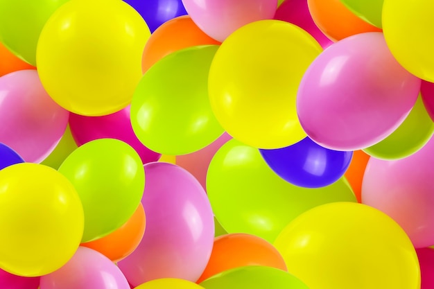 Tło wielobarwnych balonów imprezowych zmieszanych