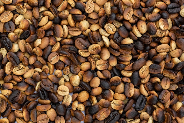 tło ziaren kawy makro,Palone ziarna kawy mogą służyć jako tło.