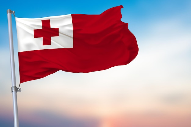 Tonga macha flagą na niebieskim niebie z symbolem narodowym oficjalnym emblematem