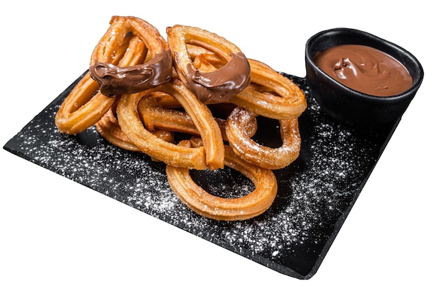 Tradycyjne meksykańskie desery churros z czekoladowym sosem izolowane na białym tle