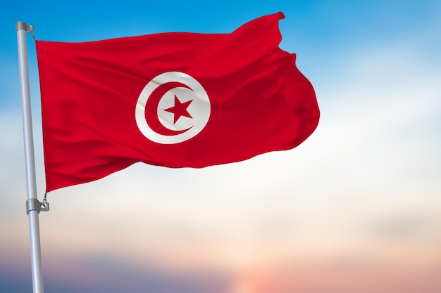 Tunezja Macha flagą na niebieskim niebie z symbolem narodowym oficjalnym emblematem