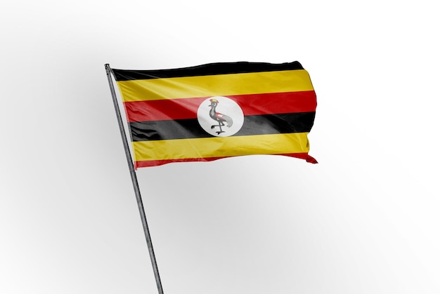 Uganda macha flagą na białym tle obrazu