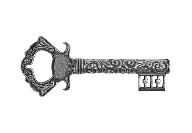 Vintage metalowy klucz na białym tle