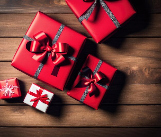 Walentynki pudełka na prezenty i czerwoną wstążką na drewniane tła