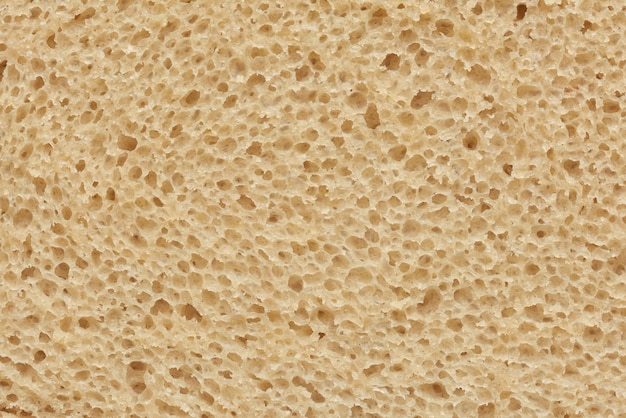 Wewnętrzna część krojonego chleba żytniego tła lub tekstury