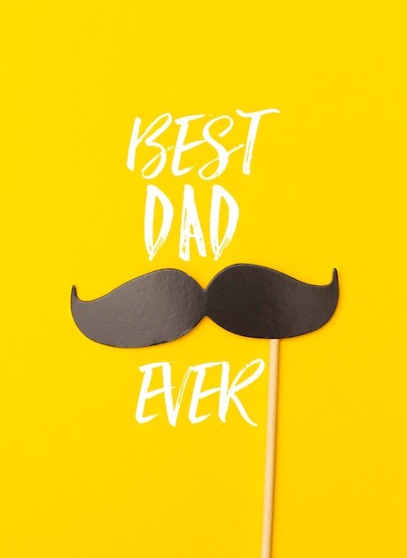 Wiadomość z życzeniami na dzień ojca z wąsami na żółtym tle