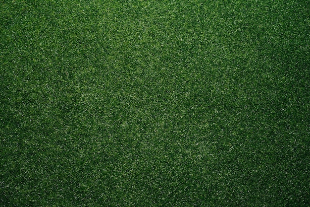 Widok z góry tekstury sztucznej trawy o głębokiej zieleni Symulacja krótko przyciętego trawnika