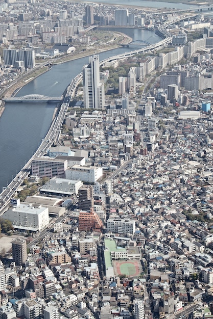 Widok z lotu ptaka drapaczy chmur budynki w Tokio mieście, Nowożytnej linii horyzontu i miastowym tle ,.