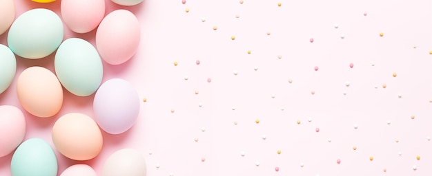 Zdjęcie wielkanocne banery, pastelowe jaja na różowym tle, wakacje wiosenne