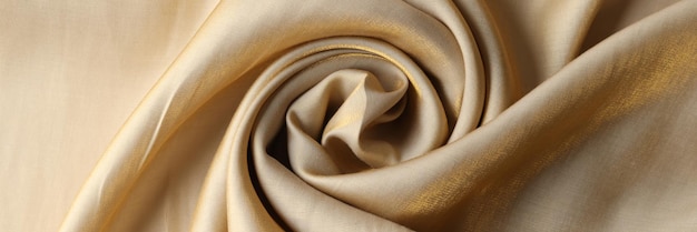 Wkręcony jednokolorowy brązowy tekstyl z bliska Brązowy falisty tkanina z bliska