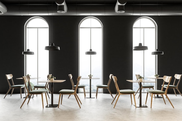 Wnętrze restauracji w stylu industrialnym z ciemnoszarymi ścianami, betonową podłogą, łukowatymi oknami i drewnianymi stołami z krzesłami. Makieta renderowania 3D