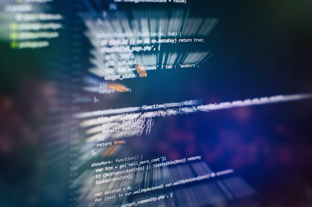Wykorzystanie CSS, JavaScript i HTML. Monitoruj zbliżenie kodu źródłowego funkcji. Streszczenie tło technologii IT. Kod źródłowy oprogramowania.