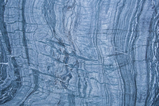 Wzór i powierzchnia niebieskich, białych i czarnych marmurowych ścian dla tła.