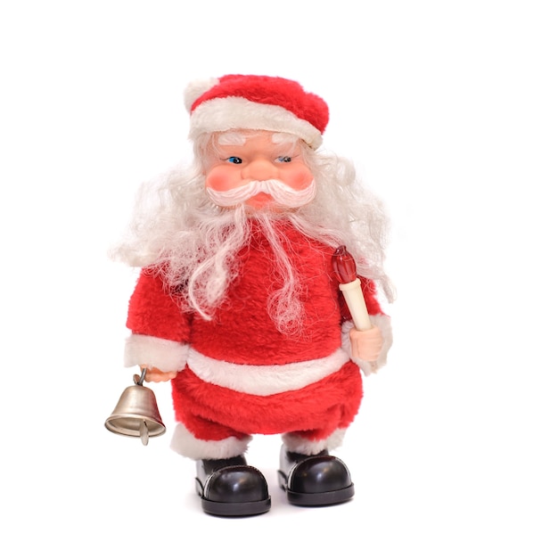 Zabawka Mikołaja z brodą w czerwonym kolorze z dzwonkiem w ręku, izolowanie na białym tle