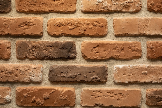 Zdjęcie zakończenie brown i beżowy podpalający ściana z cegieł