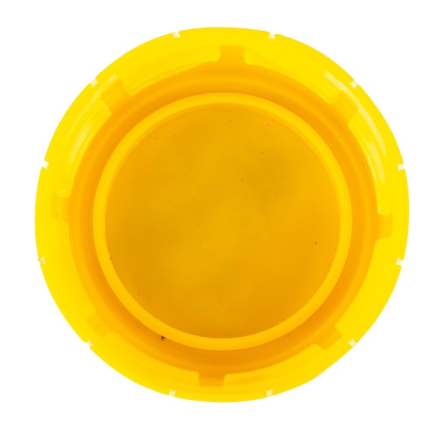 Zakrętka plastikowa żółta na białym tle
