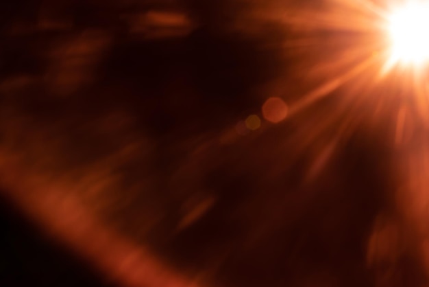Zamazany obraz Rozbłysk słoneczny na czarnym tle