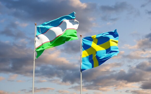 Zamknij się na flagach Uzbekistanu i Szwecji