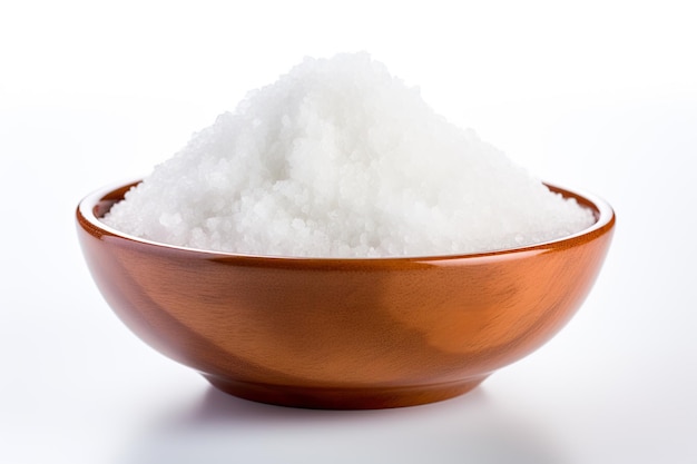Zamyka up sól na pucharze odosobnionym białym tle