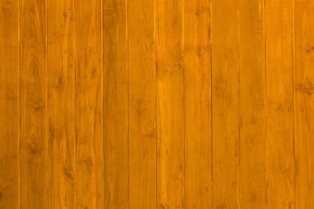 Zamyka w górę nieociosanej drewno stołu powierzchni z grunge teksturą w rocznika stylu