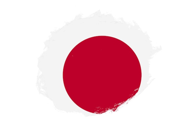 Zaokrąglone plamy obrysu pędzla teksturowanej flagi narodowej Japonii na białym tle