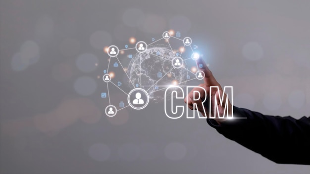 Zdjęcie zarządzanie relacjami z klientami crm dla koncepcji systemu marketingu sprzedaży biznesowej przedstawionej w futurystycznym interfejsie graficznym aplikacji usługowej do obsługi analizy bazy danych crm