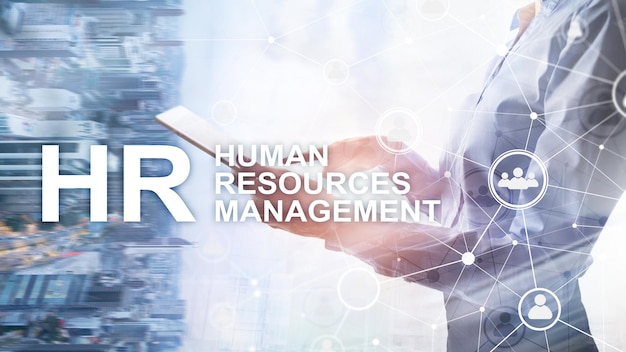 Zarządzanie zasobami ludzkimi Koncepcja budowania zespołu HR i rekrutacji na niewyraźne tło