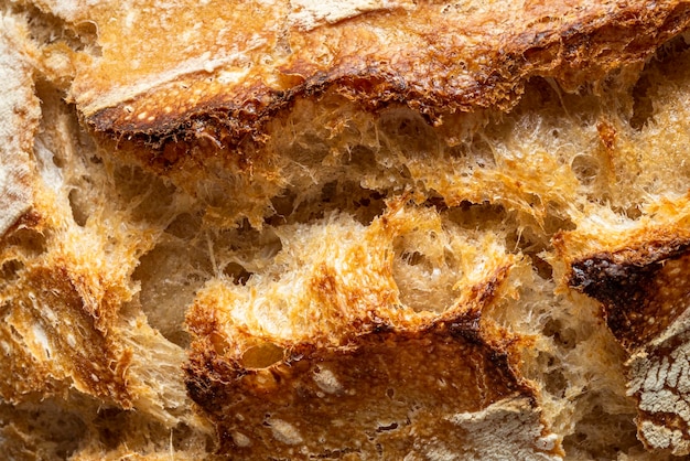 Zdjęcie zbliżenie chleba na zakwasie szczegóły makra skórki chleba