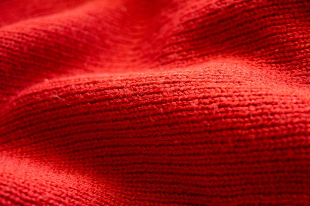 Zbliżenie czerwone dzianiny wełniane tkaniny tekstury tła