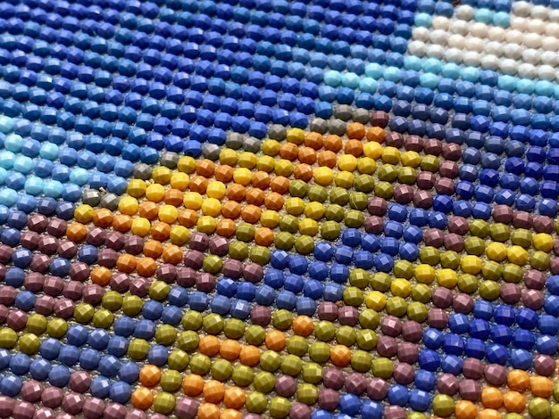 Zbliżenie kolorowa tekstura okrągły diamentowy haft jasny