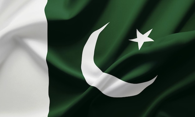 Zdjęcie zbliżenie machającą flagą pakistanu