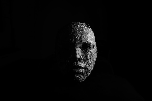 Zdjęcie zbliżenie maski na czarnym tle