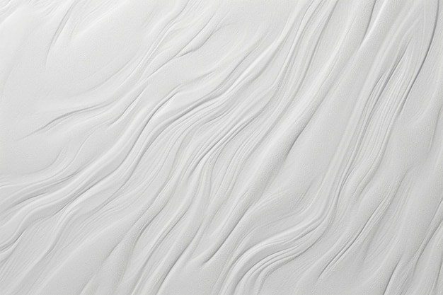 Zbliżenie na biały piasek z białą teksturą.