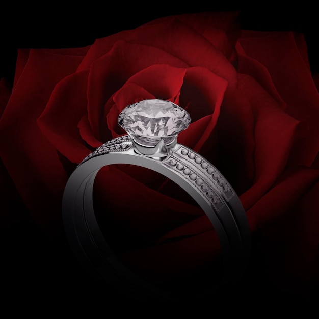 Zbliżenie na elegancki pierścionek z brylantem na tle pięknej czerwonej róży