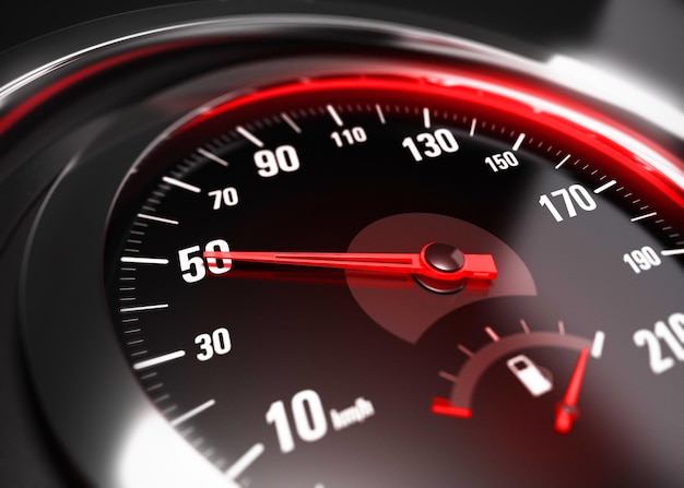 Zdjęcie zbliżenie na prędkościomierz samochodowy z igłą wskazującą 50 km h, efekt rozmycia, obraz koncepcyjny dla koncepcji bezpiecznej jazdy