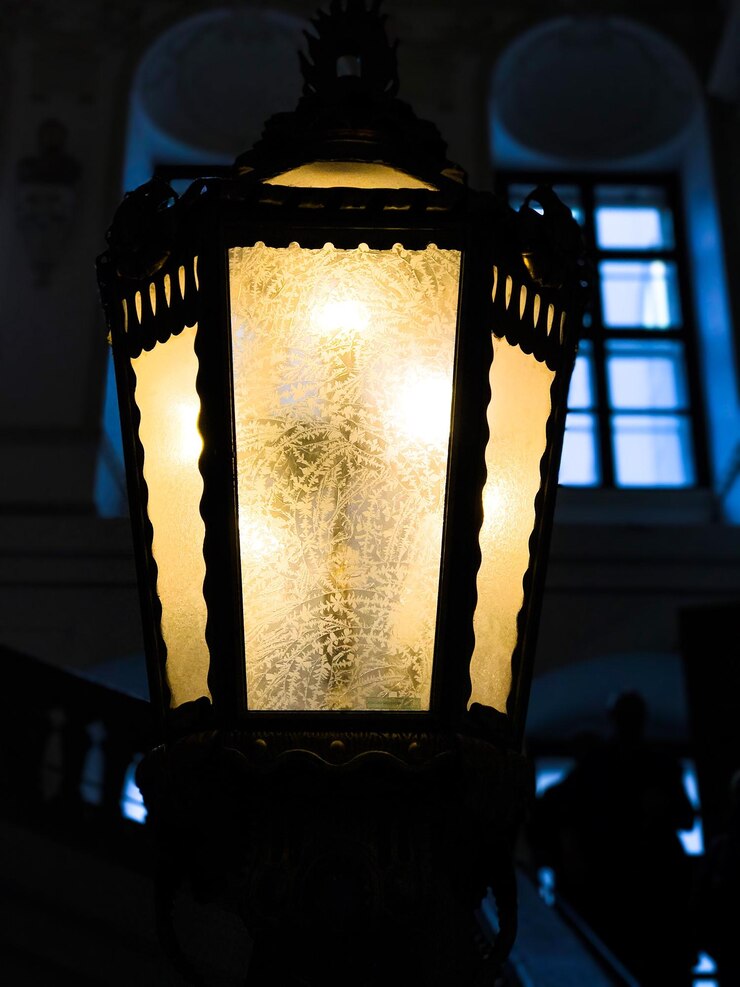 Zdjęcie zbliżenie oświetlonej lampy