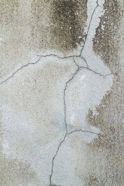 Zbliżenie pęknięty w betonowej ścianie (tekstura betonu)