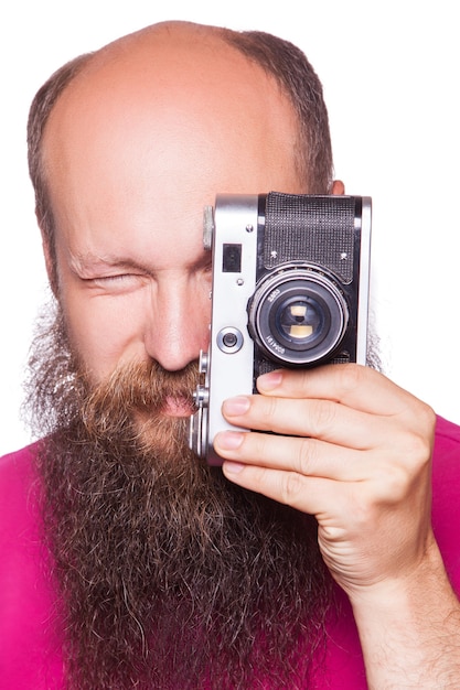 Zbliżenie portret fotografa z aparatem studio strzał