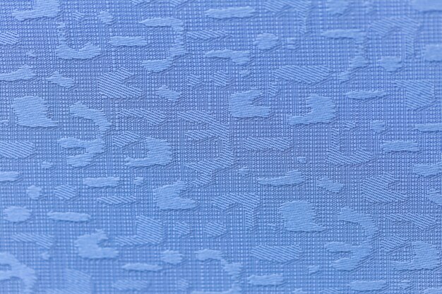 Zbliżenie tkaniny tekstury koloru błękitny tło
