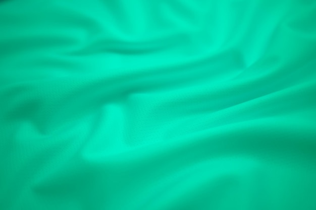 Zbliżenie Zielona koszulka piłkarska odzież tkanina tekstura odzież sportowa tło Odzież sportowa Tkanina
