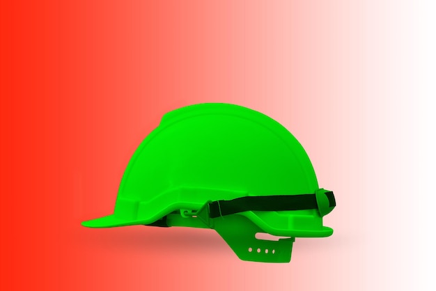 Zdjęcie zbliżenie zielonego kapelusza na czerwonym tle