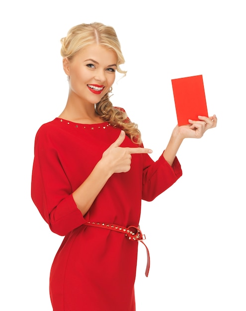 zdjęcie uroczej kobiety w czerwonej sukience z kartą nutową