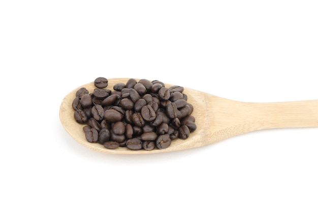 Ziarna kawy i naczynia kuchenne wykonane z drewna
